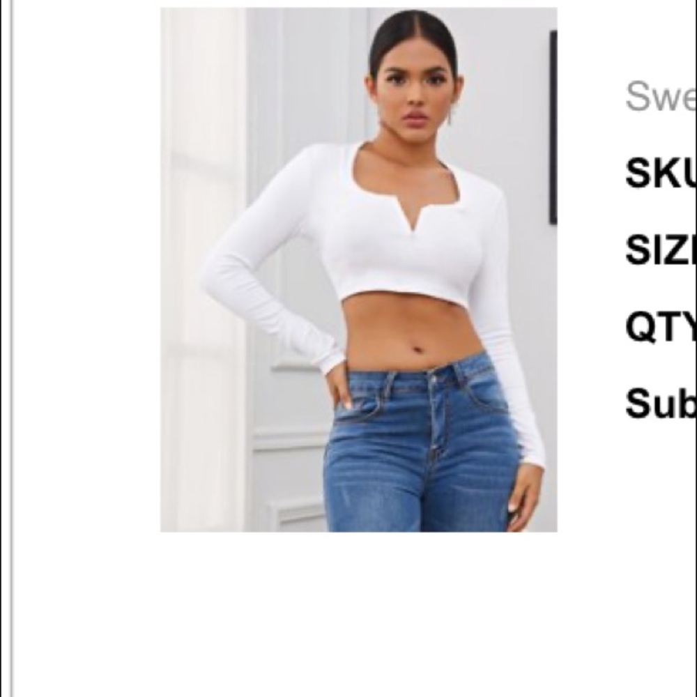 White crop top. Has v shaped metal underwire